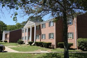 Horse Cave apartment for rent - a brick building with a tree in front of it