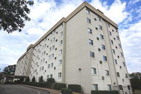 Madison apartment for rent - a large white building with a street in front of it