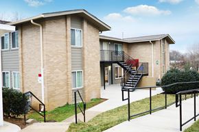 Cleveland apartment for rent - an apartment building with stairs and a sidewalk