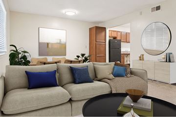 Memphis apartment for rent - A living room with a grey couch and a coffee table.