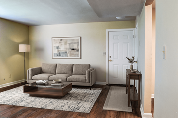 Chattanooga apartment for rent - A living room with a grey couch and a coffee table.