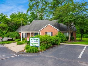 Reynoldsburg apartment for rent - A sign in front of a building that says Post Woods Information Center.