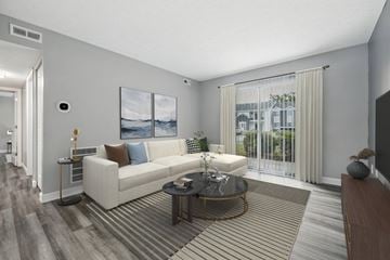 Indianapolis apartment for rent - A living room with a white couch and a coffee table.