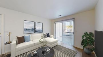 Lima apartment for rent - A living room with a white couch and a coffee table.