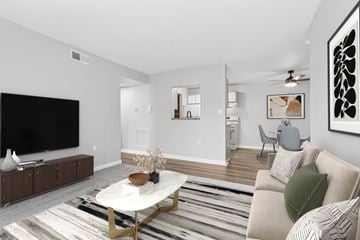 Findlay apartment for rent - A living room with a white couch and a coffee table.