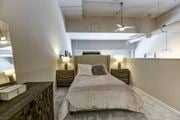 Cincinnati townhouse for rent - a bedroom with a bed in a loft at The Lofts at Shillito Place, Cincinnati, OH, 45202