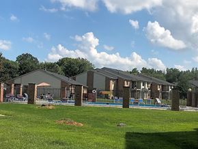 Crawfordsville apartment for rent - a house with a fenced in yard and a swimming pool