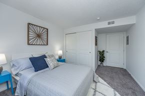 Muncie apartment for rent - a bedroom with a bed and a closet