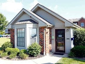 Findlay apartment for rent - A small building with a glass door and a sign that says