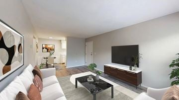 Oregon apartment for rent - A modern living room with a white sofa, a black coffee table, and a large painting on the wall.