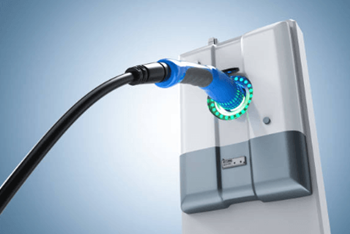 A blue ethernet cable plugged into a white modem