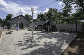 Cincinnati apartment for rent - a playground with a slide and swings at Olde Towne in Kenwood, Cincinnati