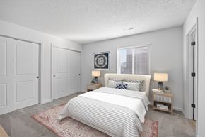 Hamilton apartment for rent - A bedroom with a large bed and two nightstands.
