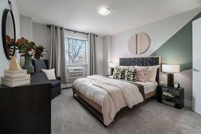 Cincinnati apartment for rent - a bedroom with a bed and a window at The Heights Apartments, Cincinnati