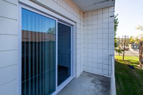 Cincinnati apartment for rent - a sliding glass door on the side of a building