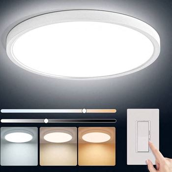 A person is pointing to a light in a room