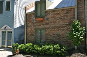 Cincinnati apartment for rent - a brick house with a window on the side of it