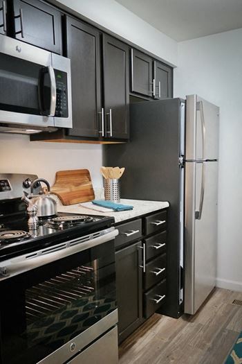 Stainless steel appliances and custom cabinetry