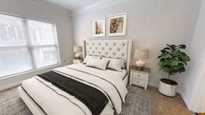 Cincinnati apartment for rent - a bedroom with a bed and two windows