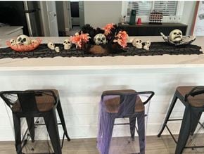 Columbus apartment for rent - A Halloween decoration with skulls and flowers on a table.