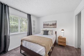 Batavia apartment for rent - Bedroom with a bed and a nightstand  at Timber Glen Apartments, Batavia, 45103
