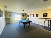 Maineville apartment for rent - Game room with pool table and pendant lighting at The Falls at Landen Apartments, Maineville
