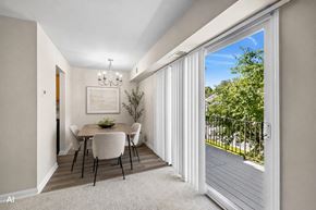 Cincinnati apartment for rent - A dining room with a table set for four.