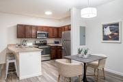 Perrysburg apartment for rent - a kitchen and dining area in a 555 waverly unit  at Waterstone Landing, Perrysburg, OH, 43551