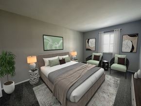 Oregon apartment for rent - a bedroom with a bed and a chair in a room