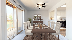 Indianapolis apartment for rent - a dining room with a wooden table and chairs and a ceiling fan at Lawrence Landing, Indianapolis, IN 46226