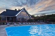 Dublin apartment for rent - a resort style pool with lounge chairs and a building in the background  at Dublin Park, Ohio