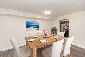Cincinnati apartment for rent - a dining room with a wooden table and white chairs at Olde Towne in Kenwood, Cincinnati, 45243