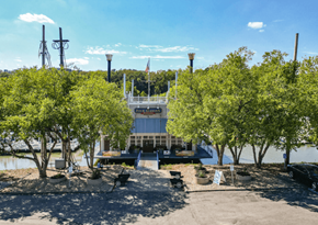 Cincinnati apartment for rent - a view of a boat dock with trees in front of it