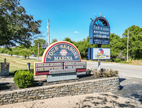 Cincinnati apartment for rent - a sign for the dog seafood marina on the side of the road