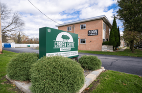 Bowling Green townhouse for rent - the sign for church hope apartments in front of a brick building