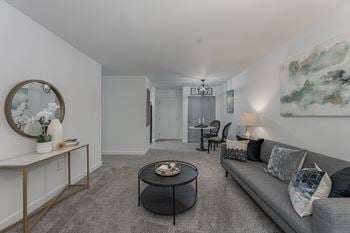 Large living room with ceramic tile flooring