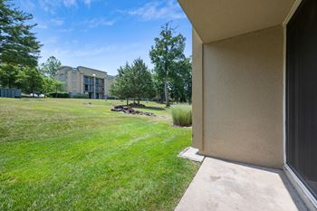 Building with grass and trees