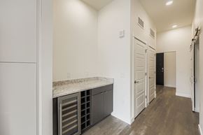 Colorado Springs apartment for rent - A kitchen with a granite counter top and stainless steel drawers.