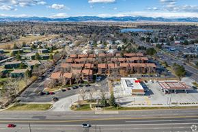 Arvada apartment for rent - A view of a town with a large building in the center.