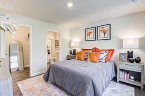 Salisbury apartment for rent - a bedroom with a bed and a door to a bathroom