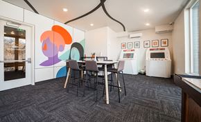 Salt Lake City apartment for rent - a dining room with a table and chairs and a refrigerator and a sink