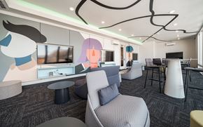 Salt Lake City apartment for rent - a lounge area with couches and chairs and a television