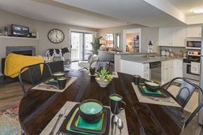 Colorado Springs apartment for rent - a kitchen and living room with a table and chairs