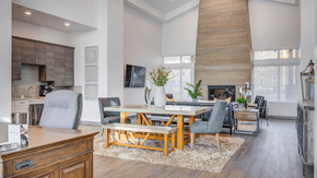 Payson apartment for rent - A modern dining room with a wooden table and chairs.