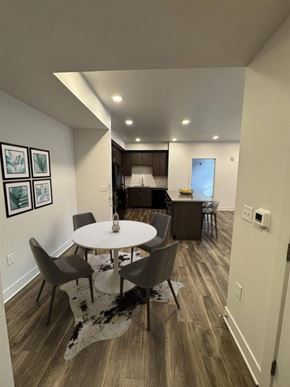 Loveland apartment for rent - A dining room with a white table and chairs.