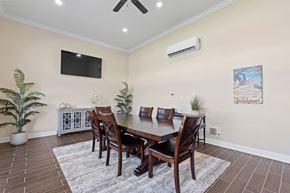 Johnstown apartment for rent - a dining room with a table and chairs and a tv