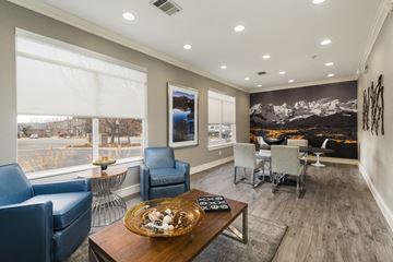Longmont apartment for rent - a living room with a table and chairs and a large window