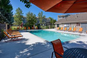 Aurora apartment for rent - our apartments have a resort style pool with lounge chairs