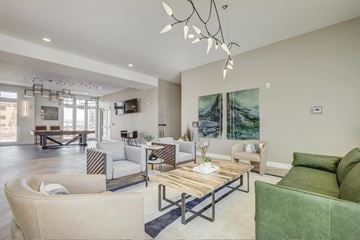 Washington apartment for rent - A living room with a green couch and a wooden coffee table.