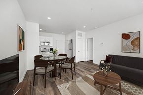 Youngtown apartment for rent - A modern living room with a dining table and chairs.